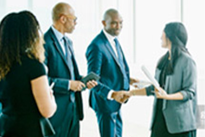Group of people shaking hands