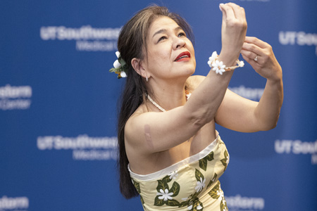 A dancer in a flowered dress