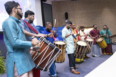 musicians playing drums on stage