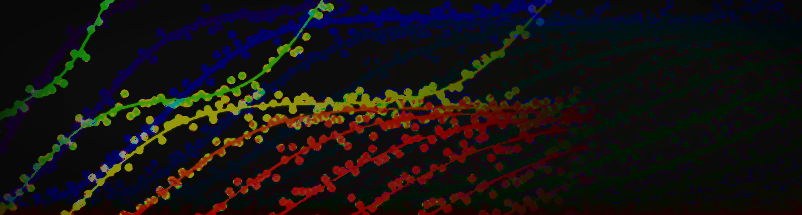 Colorful strands of microscopic materials.