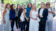 Ms.&nbsp;Landon, second from right, is surrounded by family and Health System Strategy and Business Development colleagues, including, from left, mother-in-law Kim Landon, Quynh Smith, Rebecca Tischer, Brittany Saladino, Jessica Cohron, mother Tina Kleen, and Jean Sullivan.