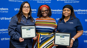 Chemotherapy Scheduling Coordinators and Platinum pin honorees Dora Gomez (left) and Rachel Smith (right) pose with their supervisor, Christal Parks.