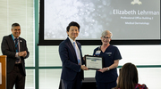 The Platinum pin recipient for Academic Affairs, Elizabeth Lehrman, is pictured with W. P. Andrew Lee, M.D., Executive Vice President for Academic Affairs, Provost, and Dean of UT Southwestern Medical School.