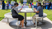 Tatiana Gonzalez, left, and Erin L. Jackson enjoy appetizing snacks.