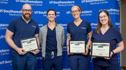 Dr. Perry (second from left) pictured with three Platinum pin recipients in Therapy Services: (from left) Christopher Williams, PT, D.P.T., Rachel Herbeck, PT, D.P.T., and Kristin Davis, PT, D.P.T.