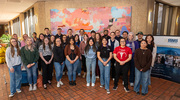 Symposium volunteers from UT Southwestern’s Medical School, Graduate School of Biomedical Sciences, School of Health Professions, and O’Donnell School of Public Health gather for a group photo.