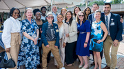 Reception attendees from the Human Resources team get into the spirit of the occasion for a photo.