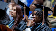 Joyane Eriom, M.P.H., eagerly awaits her moment to cross the stage.
