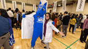 Ina Patel, D.O., Assistant Professor of Internal Medicine, celebrated the achievement of UT Southwestern’s 2025 Medical School class at Match Day by taking a photo with Champ, the Dallas Mavericks mascot. On March 21, more than 200 fourth-year UT Southwestern medical students opened envelopes to reveal where they would spend their post-graduation training – an exciting milestone for these future physicians.