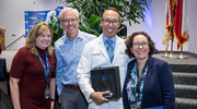 From left, colleagues Deborah Diercks, M.D., Chair and Professor of Emergency Medicine; Mark Courtney, M.D., Professor of Emergency Medicine; Dr. Salazar; and Larissa Velez, M.D., Professor of Emergency Medicine, celebrate the LCE honor.
