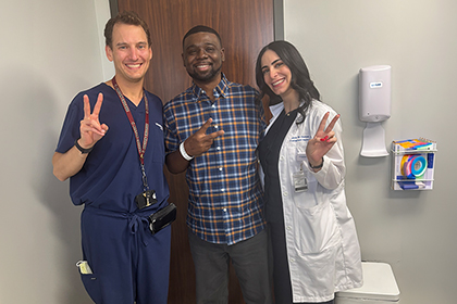 Dr. Nauser, patient Justin Tuck, and Dr. Chediak celebrate transplant - thumbnail