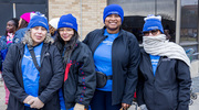 Attendees, even braving the cold, show off their spirit of community service.