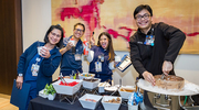 Health System celebrators indulge in the yummy ice cream options.