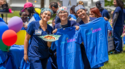 Employees pose with their complimentary swag.