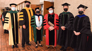 UT&nbsp;Southwestern and School of Health Professions leaders come together after the commencement ceremony.