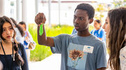 Harmony Science Academy student Ifeoluwa Aiboye observes how slime stretches to better understand structure-function relationships in the body’s soft tissues.