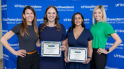 Gold pin recipients holding their certificates at the Institutional Advancement event are Elizabeth Ellen Anderson, second from left, and Trishna Naraine, both of CMPA. Celebrating with them are Ashlie McGill, left, Senior Director of Brand Strategy Partnerships, and Kristin Dupont, Director of Marketing.