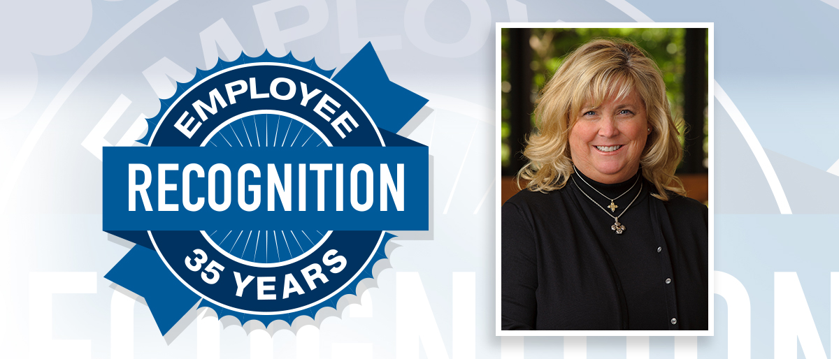 Portrait of Suzette Smith with Employee Recognition 35 Years logo