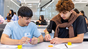 Harmony Science Academy students Sayed Hashimi, left, and Alper Gurbuz make a 3D mold of a bone with Play-Doh.