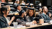 Master of Physician Assistant Studies graduates are all smiles as they await the commencement lineup.