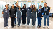 Harmony Science Academy students take time for a group photo after exploring the biomedical engineering field for half a day.