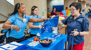 Attendees were excited to receive complimentary goodies.