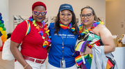 Shawna Nesbitt, M.D., M.S., Vice President and Chief Institutional Opportunity Officer at UTSW, center, takes a photo with attendees.