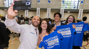 Norberto Rodriguez-Baez, M.D., Associate Dean for Student Affairs and Professor of Pediatrics, snaps a quick selfie with Emilia Chapa, Michael Zuazua, and Ellis Miller (left to right).