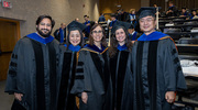 Faculty members stand proud in their regalia before the ceremony. From left: Benjamin Sabari, Ph.D., Assistant Professor in the Cecil H. and Ida Green Center for Reproductive Biology Sciences and of Molecular Biology and Obstetrics and Gynecology; Ning Liu, Ph.D., Professor of Molecular Biology; Denise Marciano, M.D., Ph.D., Associate Professor of Internal Medicine and Cell Biology; and Kathryn O’Donnell, Ph.D., and Jun Wu, Ph.D., Associate Professors of Molecular Biology.