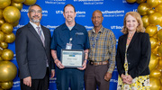 Platinum pin recipient Michael Brackney in Building Maintenance stands proud at the Business Affairs ceremony beside, from left, Juan Guerra Jr., M.B.A., M.Eng., Vice President for Facilities Management; Kenneth Gabriel, Facilities Manager; and Holly Crawford, former Executive Vice President for Business Affairs.