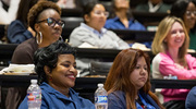 Attendees enjoy the panel discussion and subsequent musical performance.