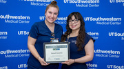 Smiling proud upon receiving her Platinum pin is nurse Hannah Barentine, left, beside Jocelyn Ponce, Assistant Nurse Manager at 7 Green in Clements University Hospital.