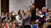 Event attendees give a standing ovation to Darren Fleming, recipient of the Spirit of UT&nbsp;Southwestern Award.