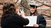 Doctor of Physical Therapy graduate Jenna Abraham captures the special day in a celebratory photo.