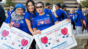 The Perianesthesia team represents with their custom signs to showcase the UTSW spirit.
