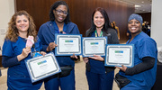 Ice cream makes the win even sweeter for this group of Health System Gold PACT pin recipients from Day Surgery. From left: Amina Rajani, Ketina Washington, Jomie Rillera, and Tynisha Butler.