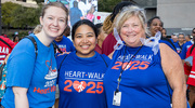 Suzi Smith (far right), Director of Student Services, and fellow walkers get pumped up for the walk to begin.