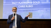 Health System Vice President and Chief Operating Officer Chris Rubio, M.B.A., presents to PACT Platinum and Gold pin recipients for the Health System.