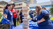 Jenga was a massive hit as attendees compete to win a free UTSW T-shirt.