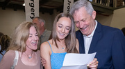 Madison Korb and her proud family look over her Match Day letter.