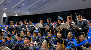 Graduates recite the School of Public Health Oath after receiving their diplomas.