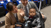 Dr. Park celebrates her win with her husband, Matthew Cahalane, and their son, Julian.