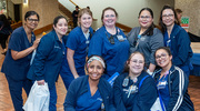 UTSW employees enjoy the afternoon festivities with a group photo.