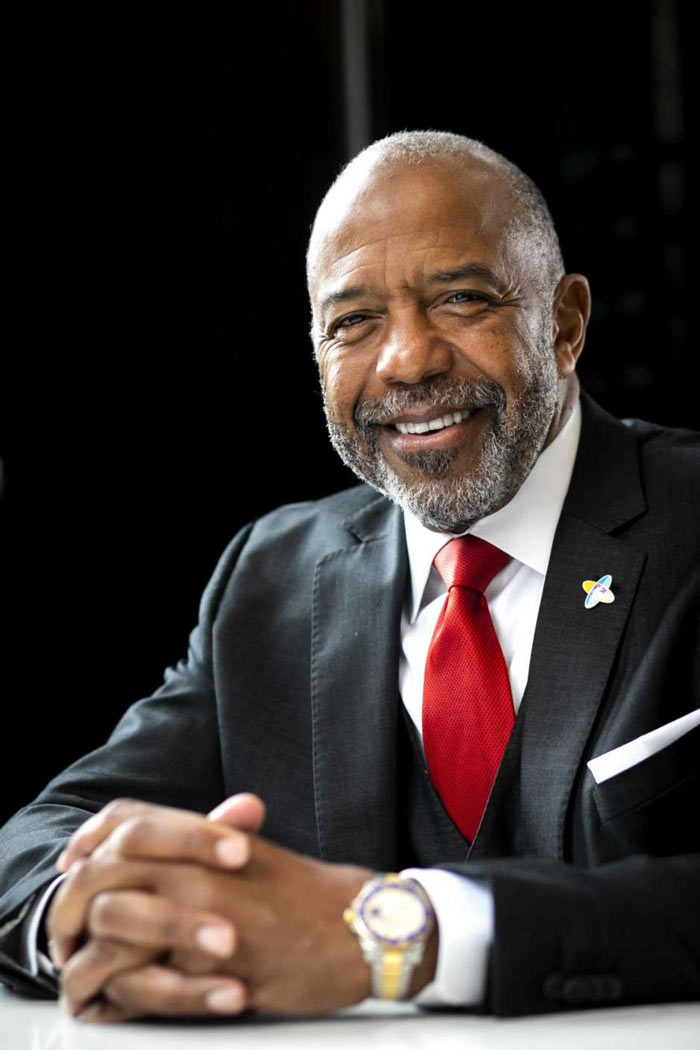 Man in suit smiling