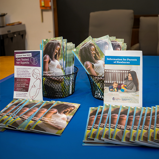 table with pamphlets about syphilis and public health