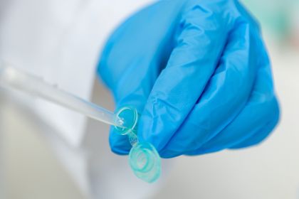 a syringe pulling up medicine