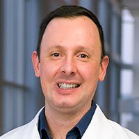 headshot of Marco Aguirre, M.D.