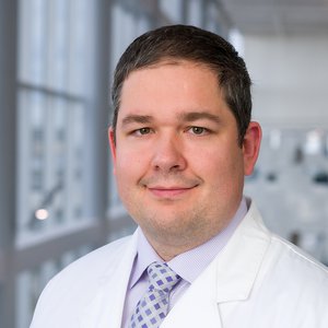 Headshot of Tyler Poi, M.D.