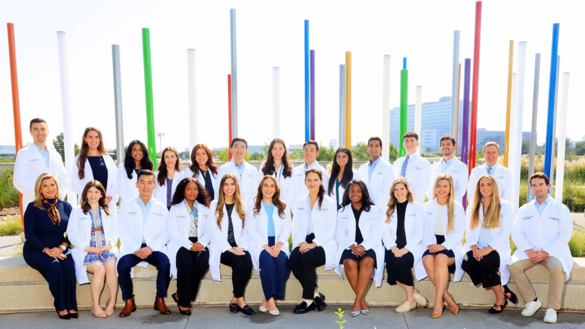 group of all dermatology residents with faculty