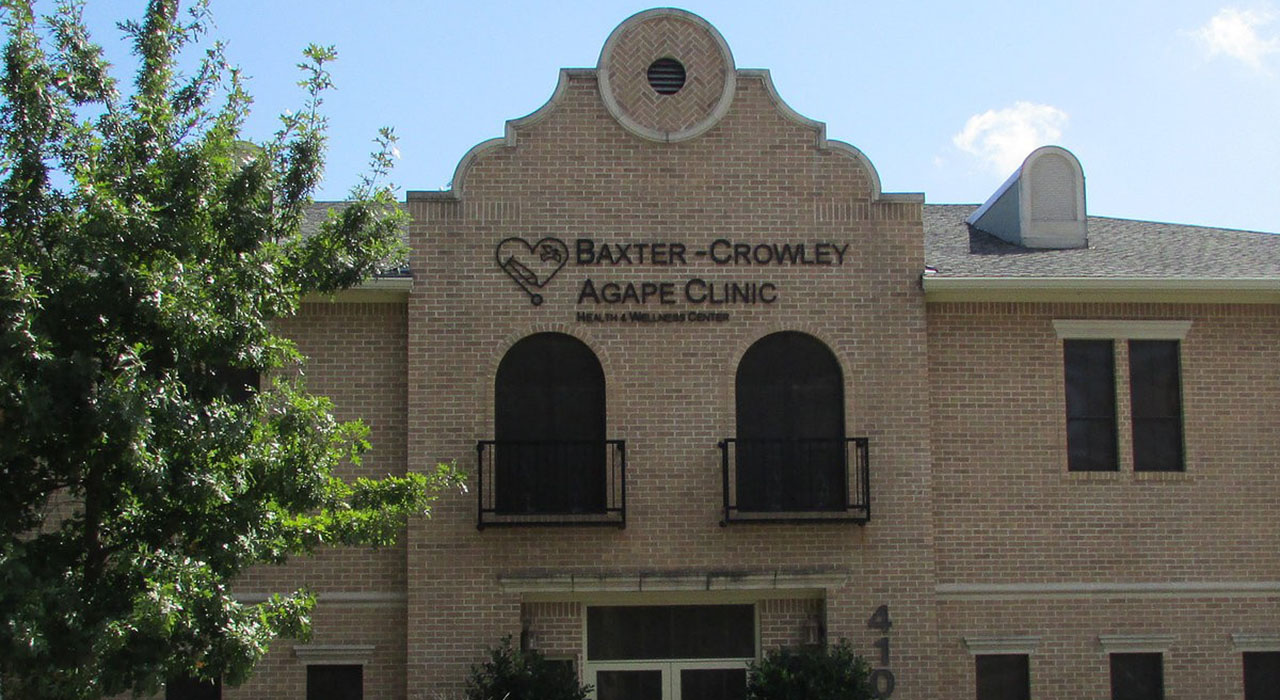 A photo of the front of the Baxter-Crowley Agape Clinic building